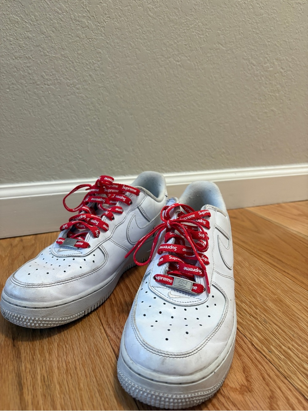 Nike White Air Force Ones with Red Supreme Laces